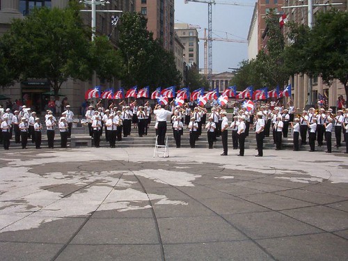 high school band performing at the Navy Memorial