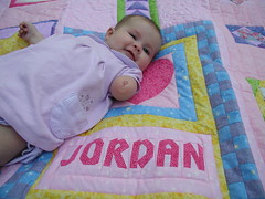 Posing on her quilt
