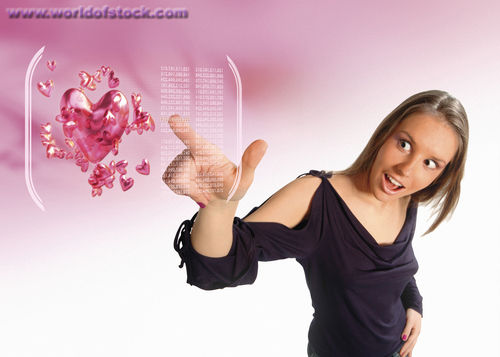 Woman touching a virtual screen with a liquid heart Stock Photo  byMaciej Frolow
