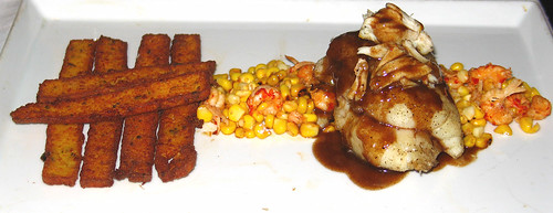 Saut´ed Speckled Trout topped with a Crown of Lump Crabmeat, with Sweet Corn & Crawfish Relish, Polenta Fries and Louisiana-style Barbecue Sauce