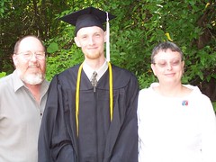 the grad and his parents