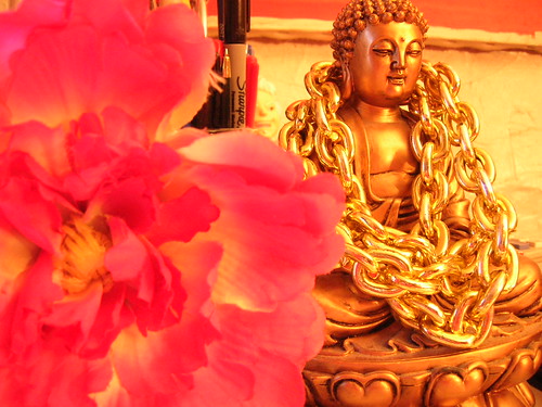 gold chain buddha on my desk