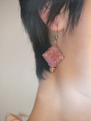 Pink glass earrings: worn