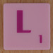 Scrabble pink tile letter L