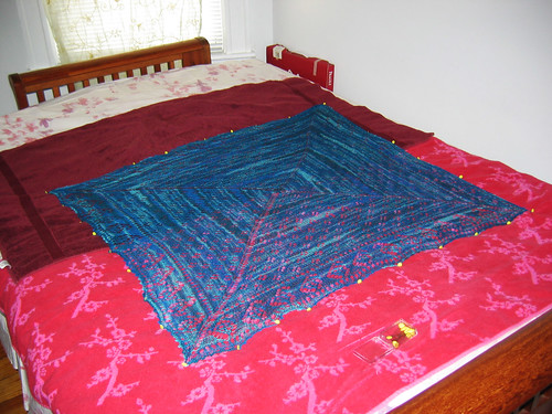 paisley lace shawl blocking on bed