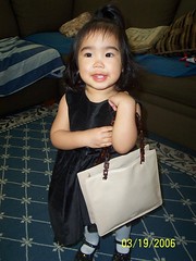 Baby Girl with Mommy's Prada Bag