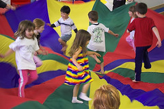 Children parachute play
