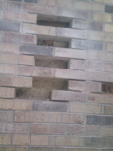 Brick repair on home