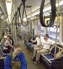 Elevated train car, Chicago, with aisle-facing seating