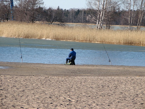 Fisherman at Hietaniemi beach
