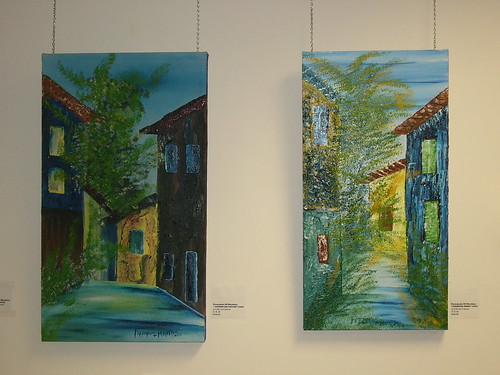 Two paintings of Mr. Di Martino's home town in, Minas Gerais, Brazil