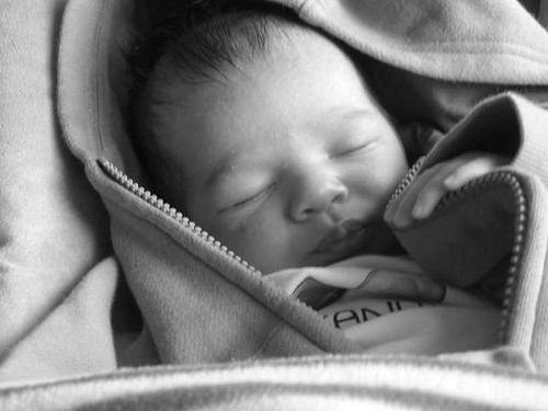 Giovanni sleeps in his new hoodie, B&W