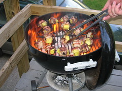 pineapple wrapped in bacon - on fire.