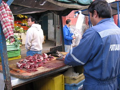 Vendor prepares fish