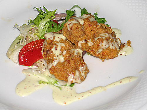 Amuse bouche: Andouille-Crusted Oysters with Green Salad and White Rémoulade Sauce