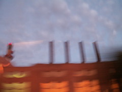 second view of a factory at dusk