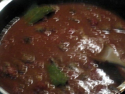 Add stock,tomatoes & boil (dark)
