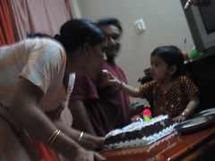 Giving Amma a bite of the cake