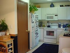 Kitchen After (Pineapple Fizz on everywhere except by pantry, Planetarium on Bottom, Chair rail in between)