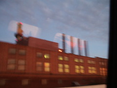 view of a factory at dusk
