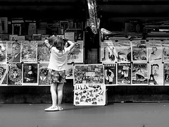 Reader at the street bookstore