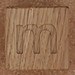 Wooden brick lowercase letter m