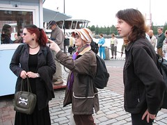 Marianna, Liisa and Pasi waiting for the boat to arrive