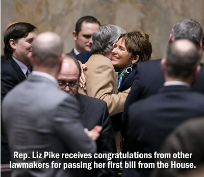 Rep. Liz Pike congratulated for passing first bill