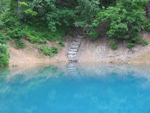 Stairs from a blue lake