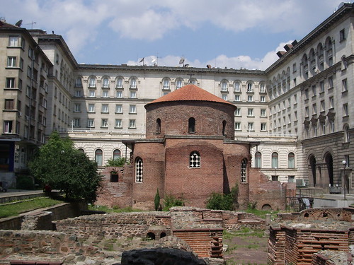 Early Church surrounded by Communist Buildings
