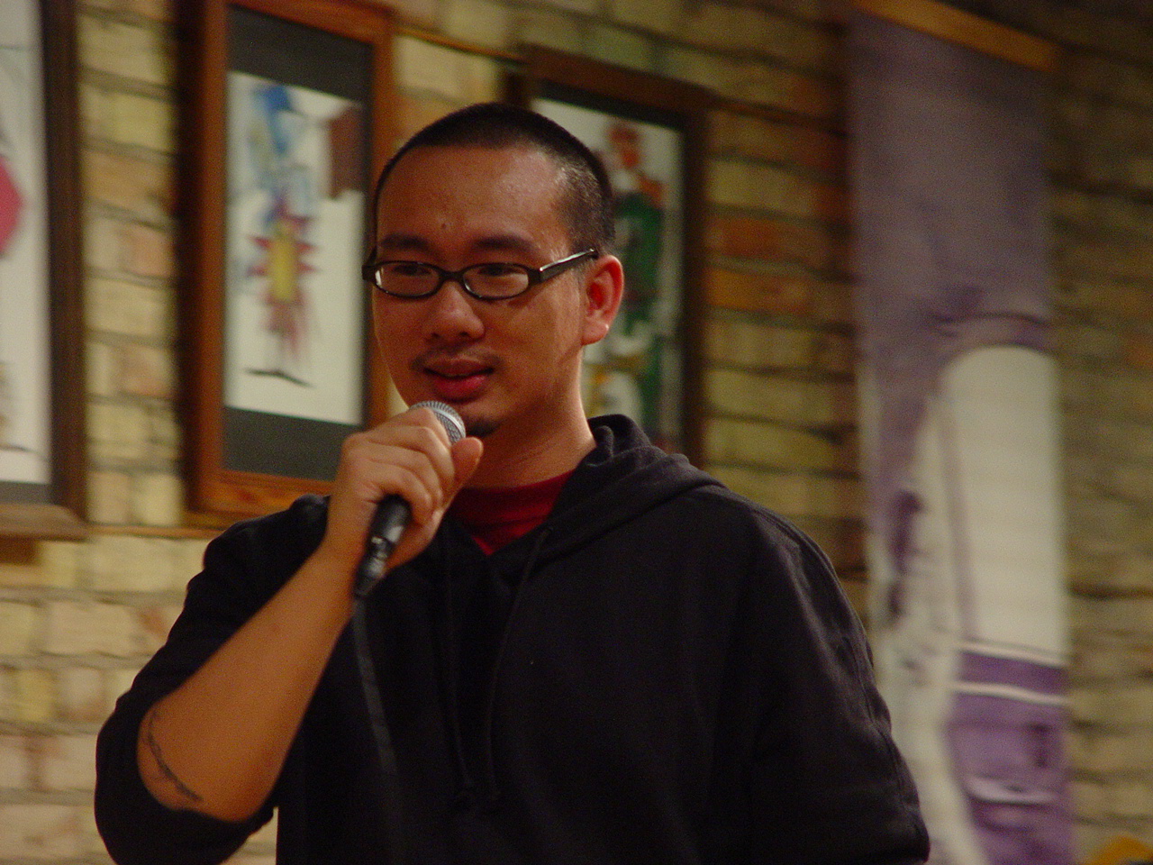 Bao Phi in 2005 reading at the debut of Real Karaoke People by Ed Bok Lee
