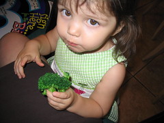 Amber eating broccoli