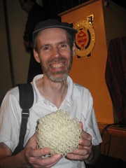 Paul Kates holding a quasicrystal construction.