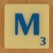 Scrabble blau Lletra M