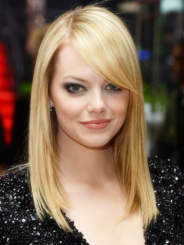 hairstyles-with-bangs-emma-stone-long-side-swept-bangs