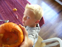 Aiden's salute to wee hallowed out pumpkins.