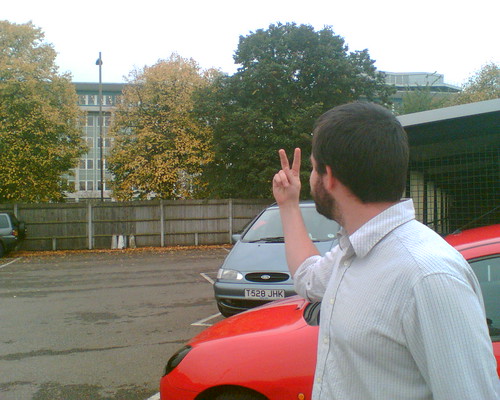 Neil waving a cheery goodbye to his employer