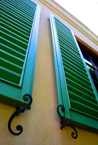 Green Shutters on Yellow