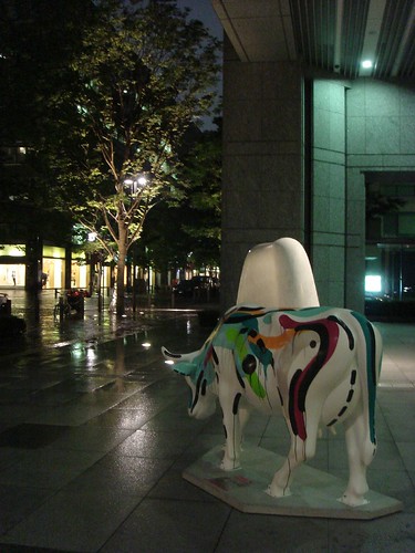a painted cow in midnight