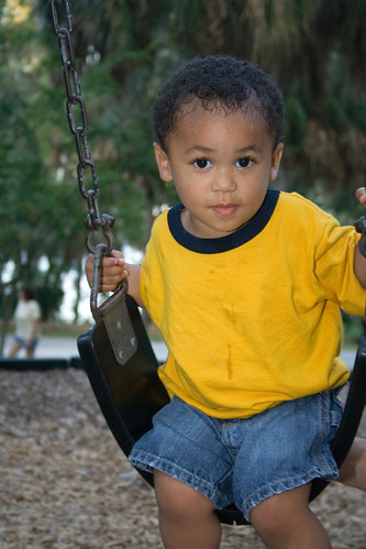 Kenny looking quite GQ on the swings