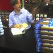 Gordon signing bunches of books