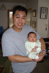 Uncle Nick and me - about 8 weeks old