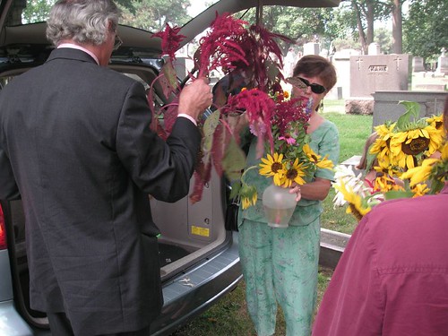 Jeannie and Joe unloading the flowers