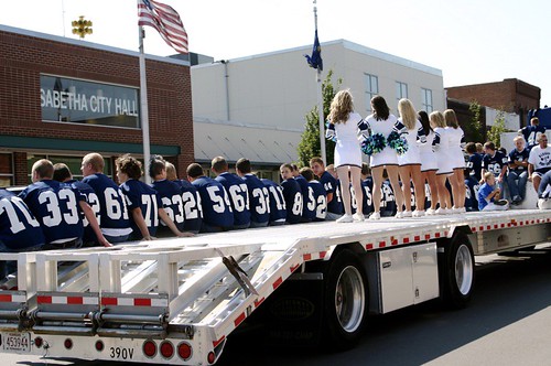 Life on a flatbed truck with cheerleaders
