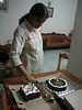 Amma cuts her birthday cake