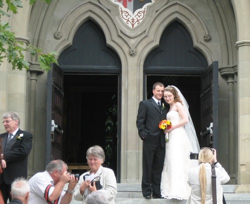 Aaron and Vanessa in front of the church
