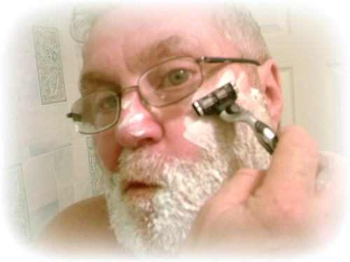 Self Portrait of a Shaving, Bearded Man