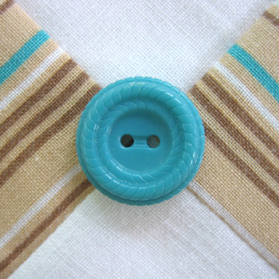 turquoise button