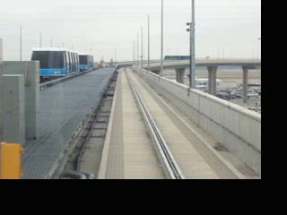 Riding on Skylink at DFW (clip #7) - November 14, 2005.  Taken from a very 
