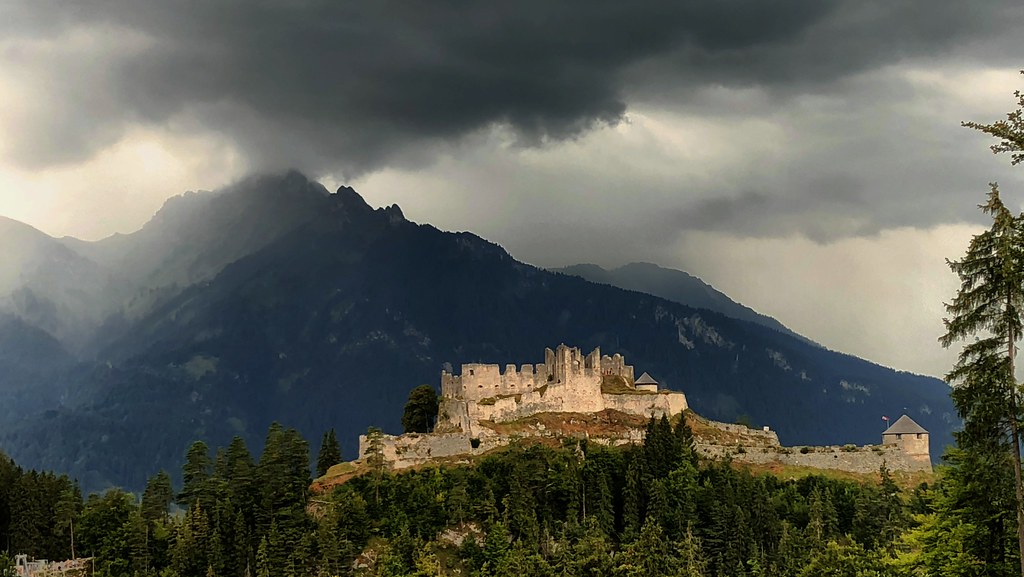 The castle ruin Ehrenberg by thunderstorm